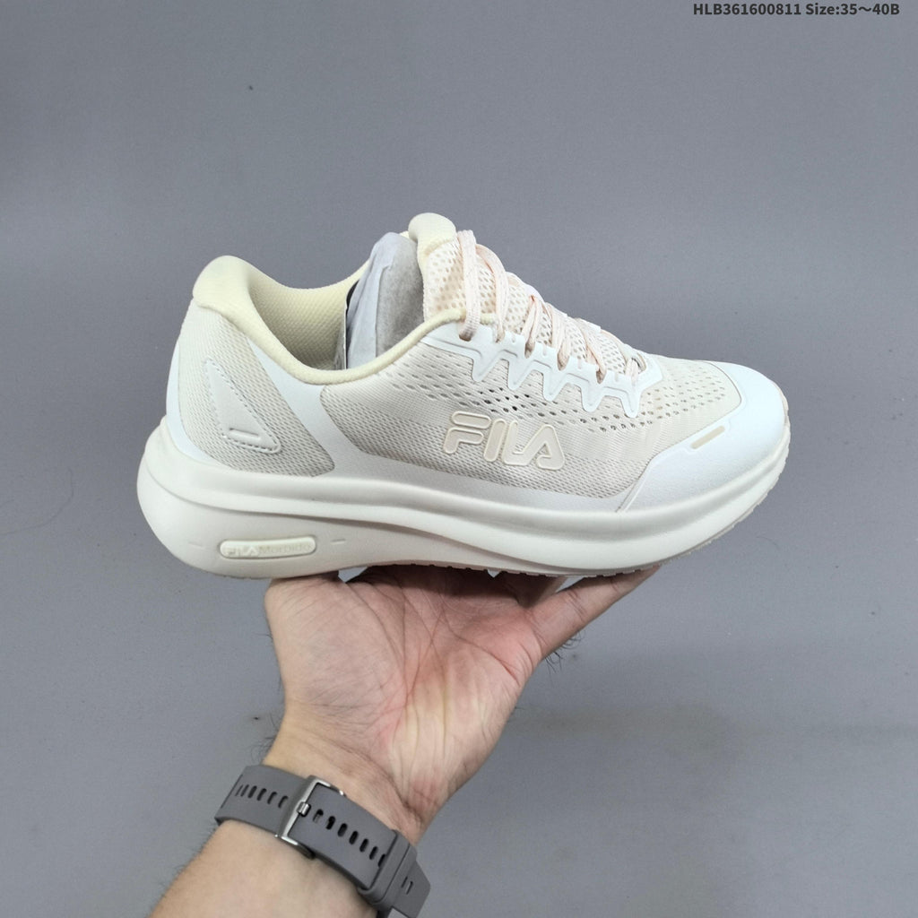 Ivory FILA Pebble Sandal Sneakers - product image from the listing.