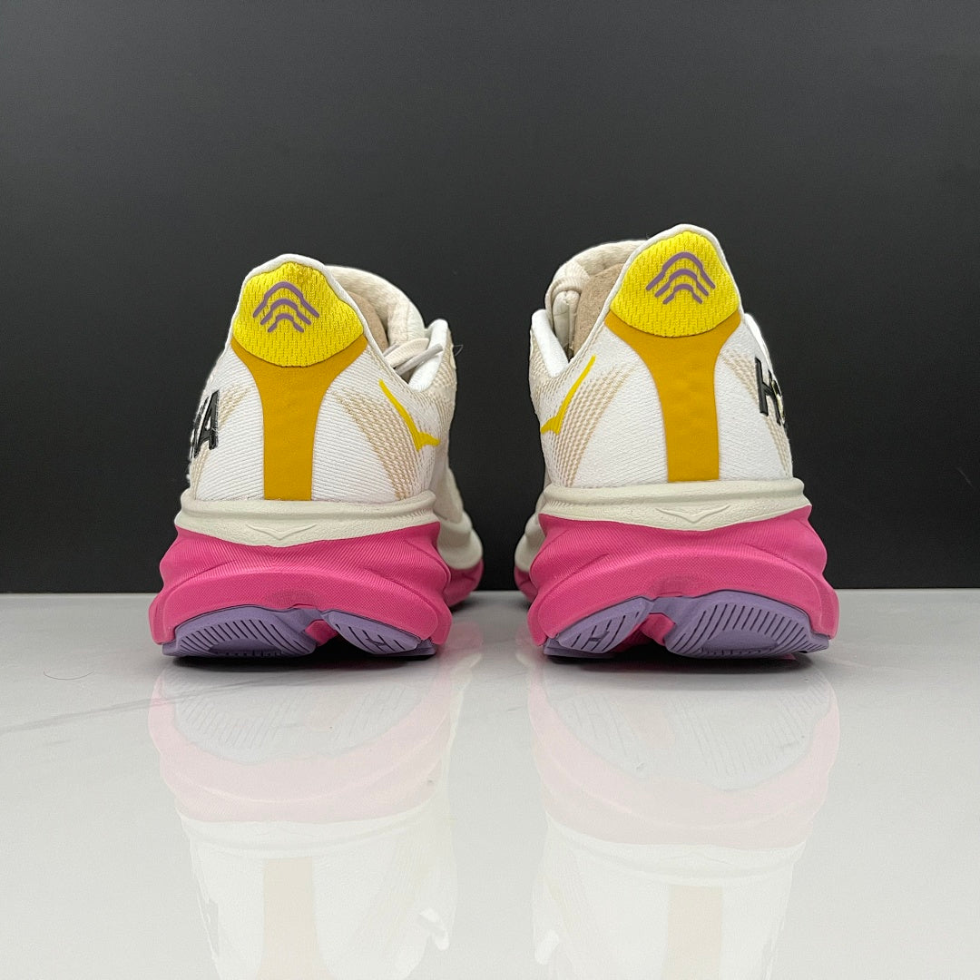 Ivory and Pink HOKA Clifton 9 Running Shoes - product image from the listing.