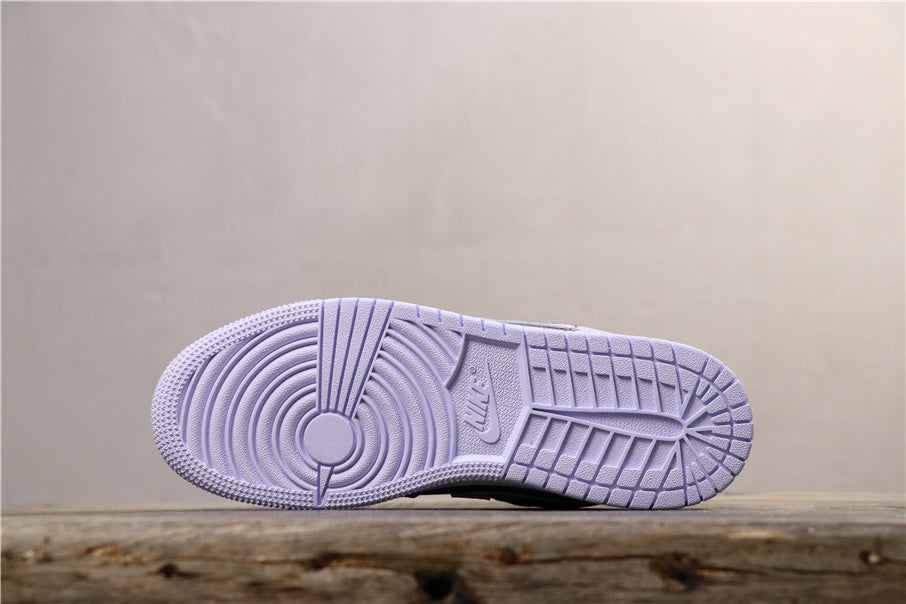 Air Jordan 1 Low Oxygen Sneakers in Purple 554723-505 - product image from the listing.