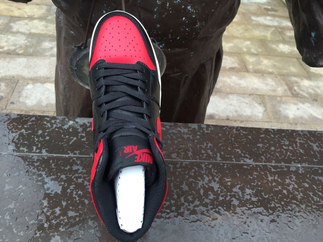Air Jordan 1 High Sneakers in Black Red White - product image from the listing.