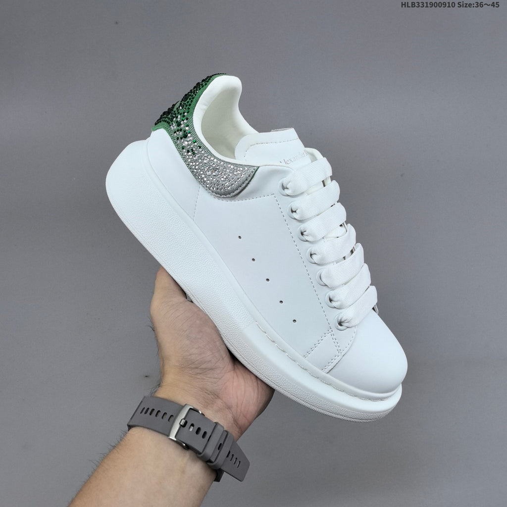 Alexander McQueen Oversized Low-Cut Sneakers with Crystal Heel - product image from the listing.