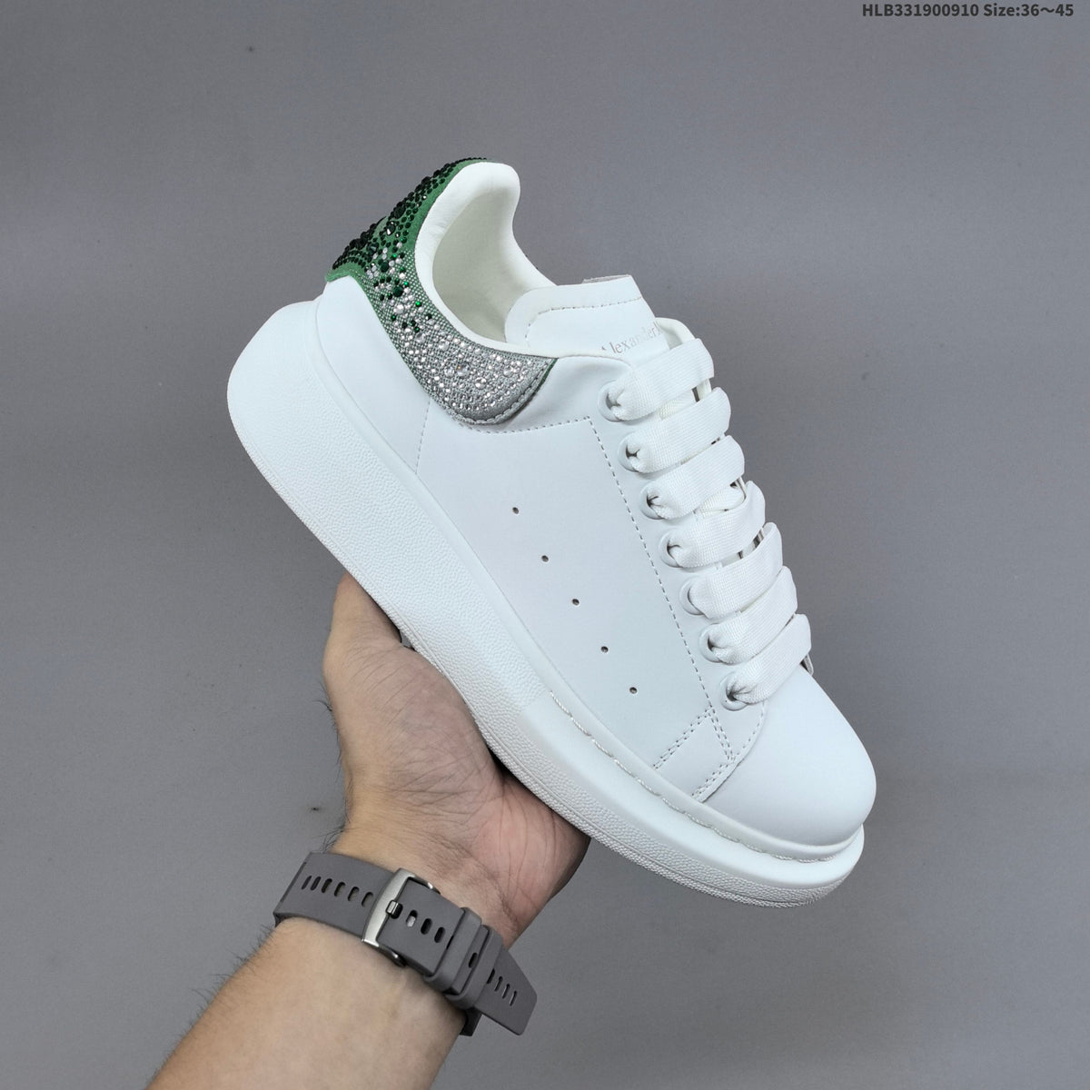 Alexander McQueen Oversized Low-Cut Sneakers with Crystal Heel - product image from the listing.
