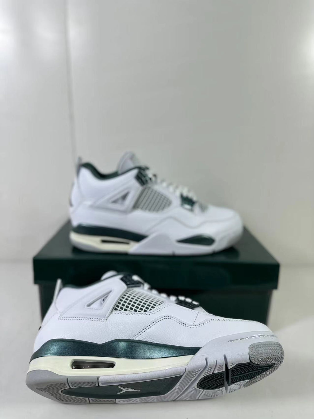 Air Jordan 4 Retro Bucks White Green Sneakers FQ8138-103 - product image from the listing.