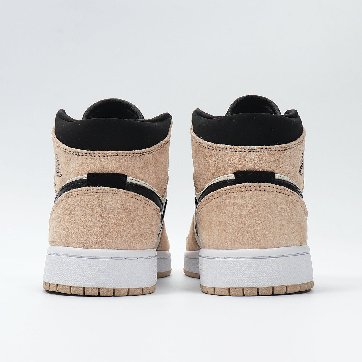Jordan 1 Low BQ6472-800 Sneakers in Tan and Black - product image from the listing.
