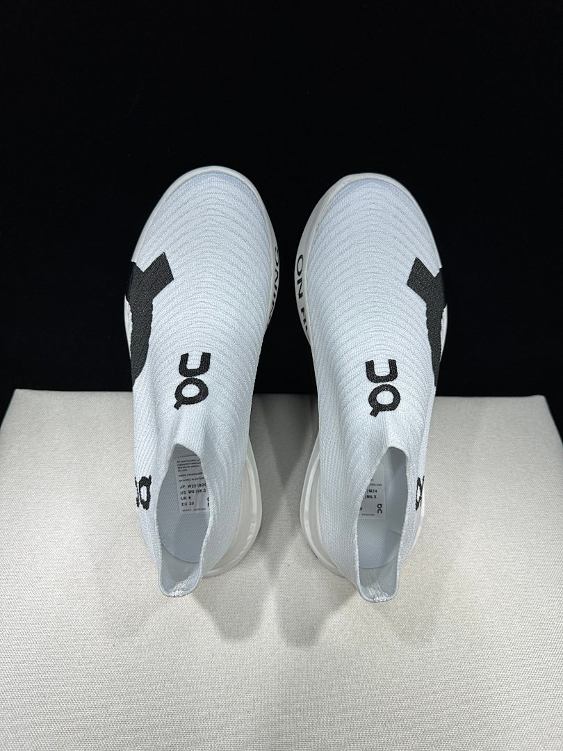 On Cloudboom Strike LS Running Shoes in White Black - product image from the listing.
