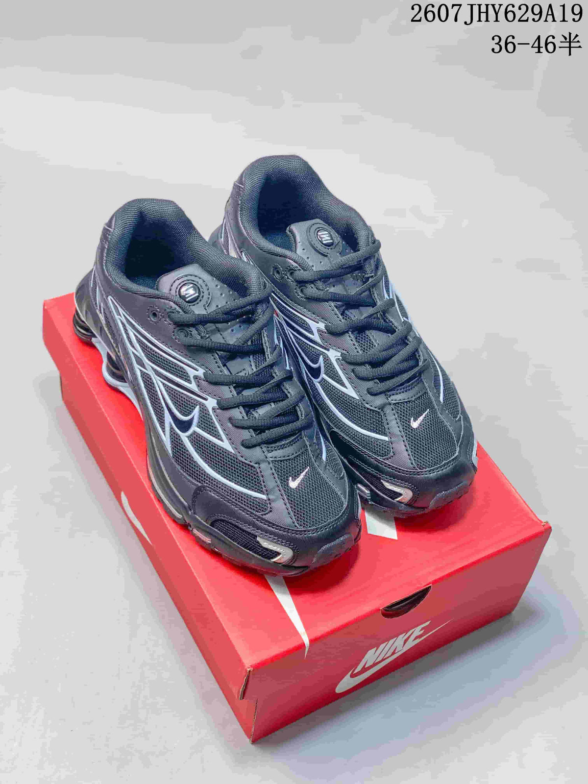 Nike Shox Ride 2 Sneakers in Black or in White - product image from the listing.