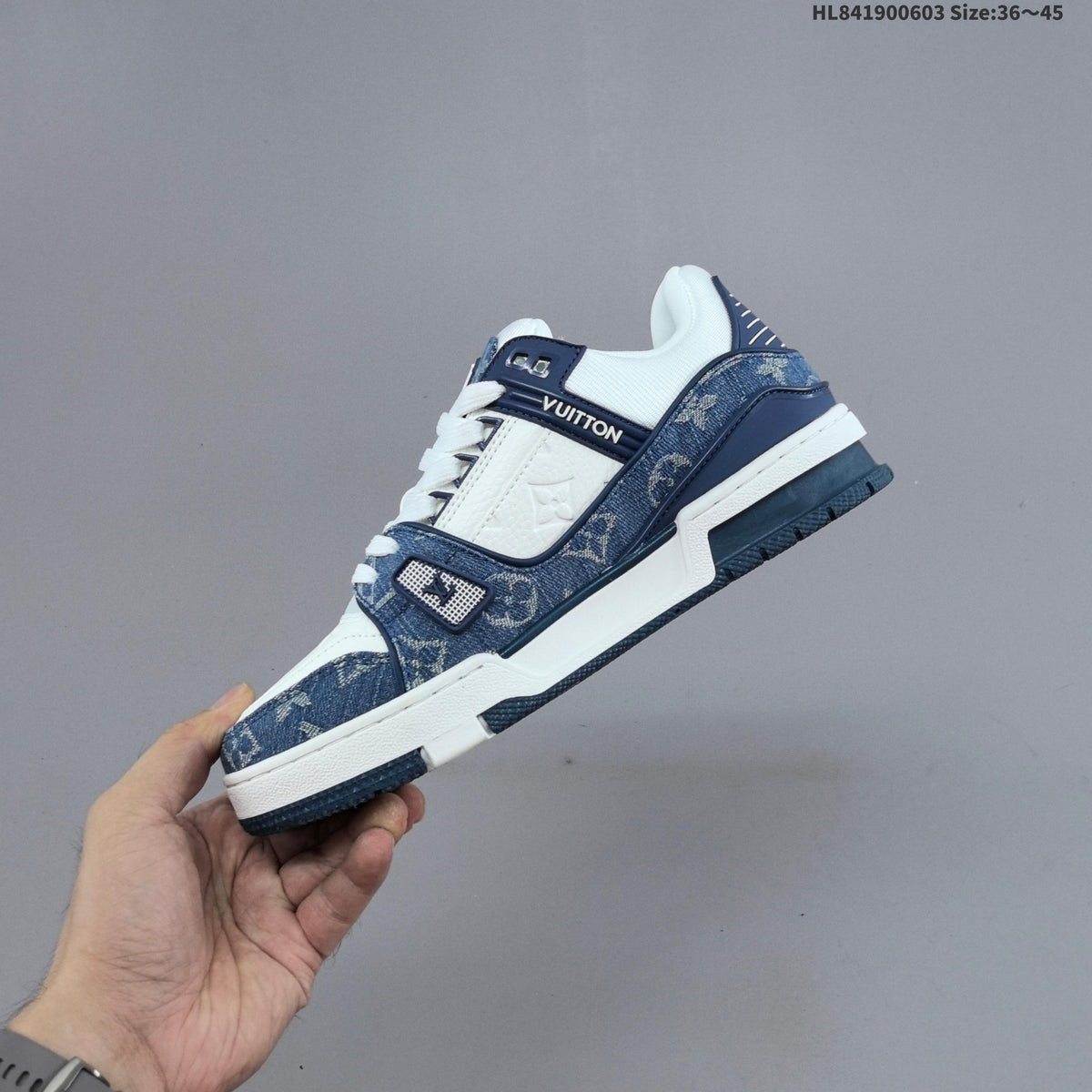 Louis Vuitton Low-Top Sneakers in Black or in Blue and White - product image from the listing.