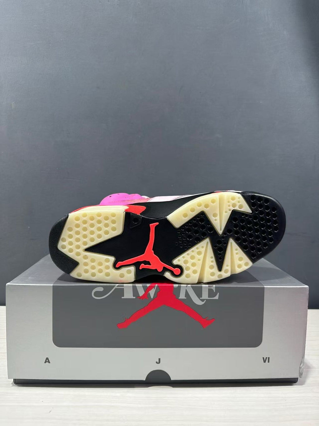 Jordan x Awake NY Air Jordan 6 Retro SP Sneakers in Pink IQ5706-600 - product image from the listing.