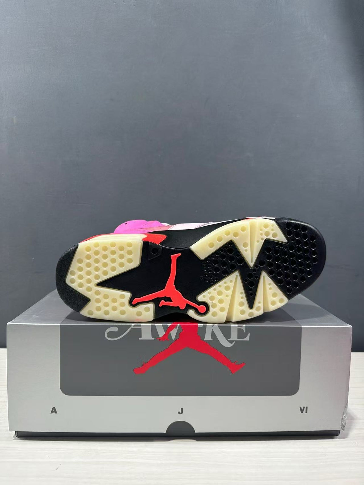 Jordan x Awake NY Air Jordan 6 Retro SP Sneakers in Pink IQ5706-600 - product image from the listing.