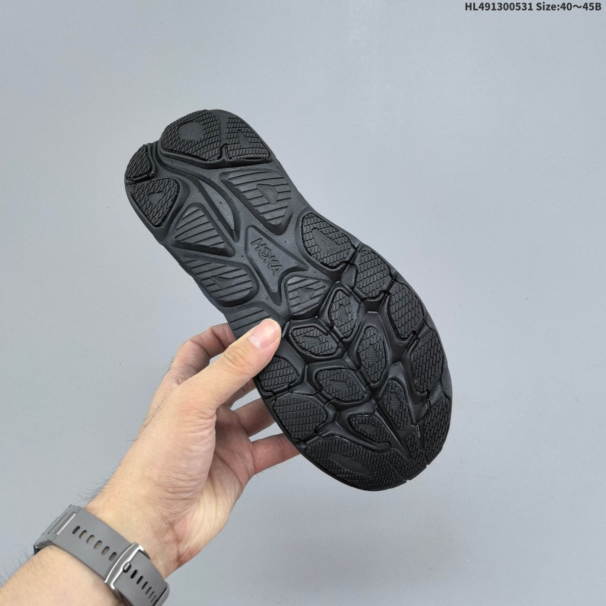 Navy and Black HOKA Clifton 10 Running Shoes - product image from the listing.