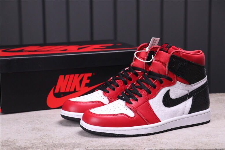 Women's Air Jordan 1 Satin Snake High-Top Sneakers CD0461-601 - product image from the listing.