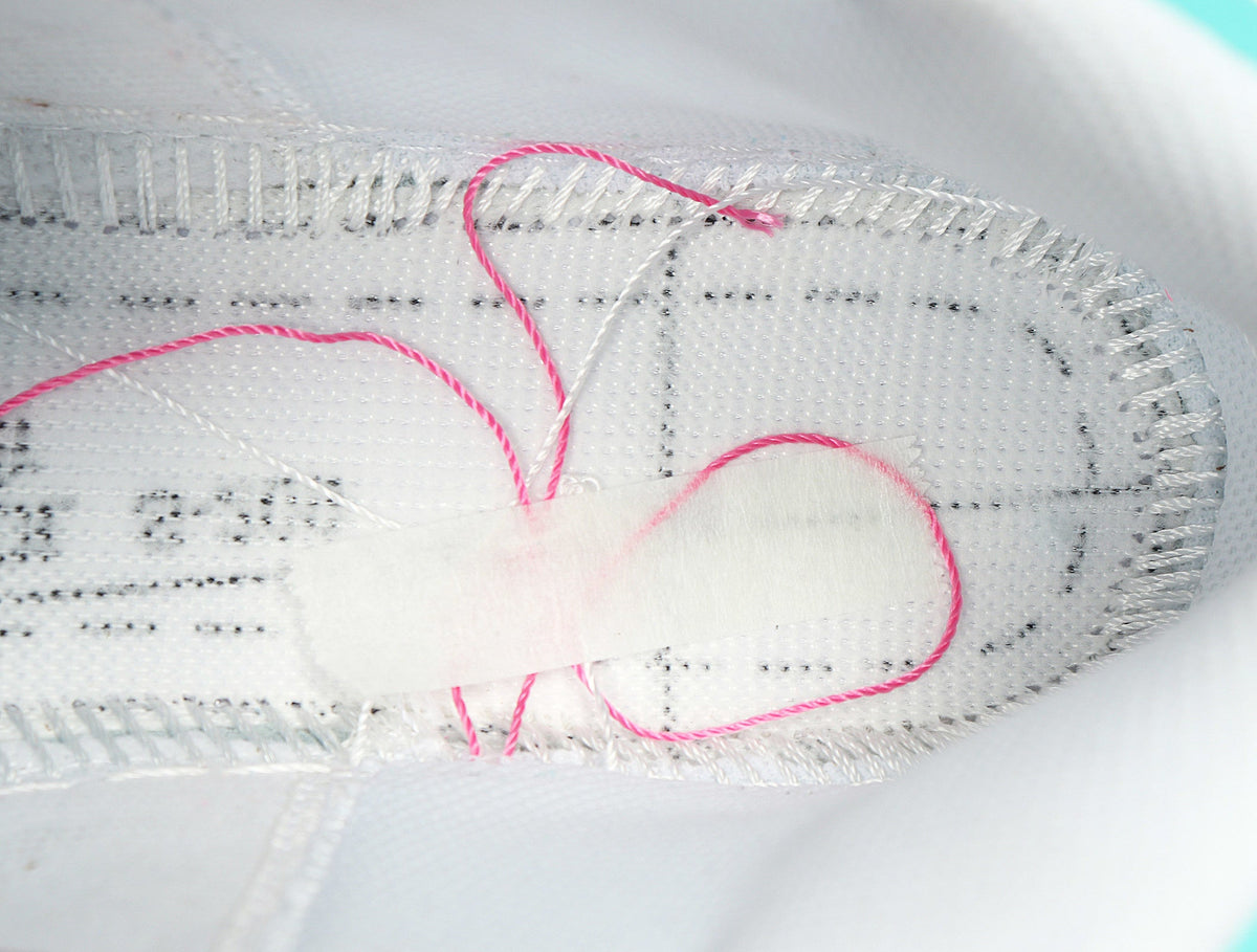 Jordan 1 Mid Sneakers in White Pink Turquoise 555112-102 - product image from the listing.