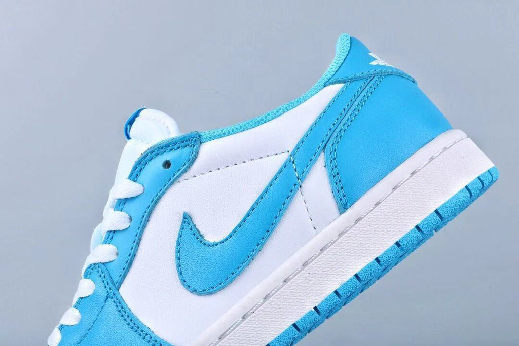 UNC Blue and White Sneakers 401 - Jordan 1 Low SB - product image from the listing.