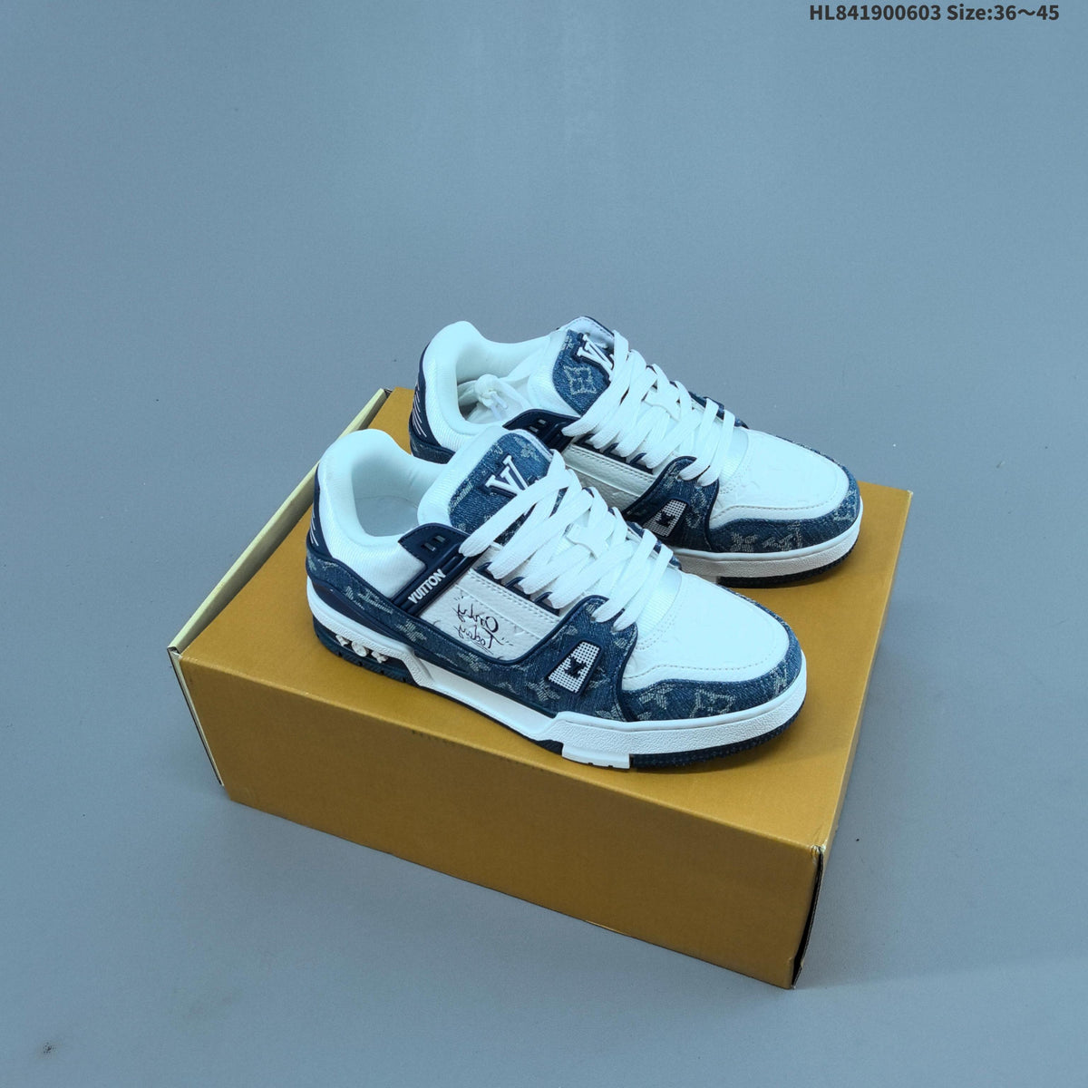 Louis Vuitton Low-Top Sneakers in Black or in Blue and White - product image from the listing.