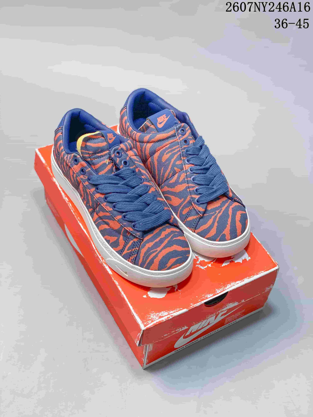 Nike Devin Booker x Blazer Low Trainers Blue/Orange 2607NY246A16 - product image from the listing.
