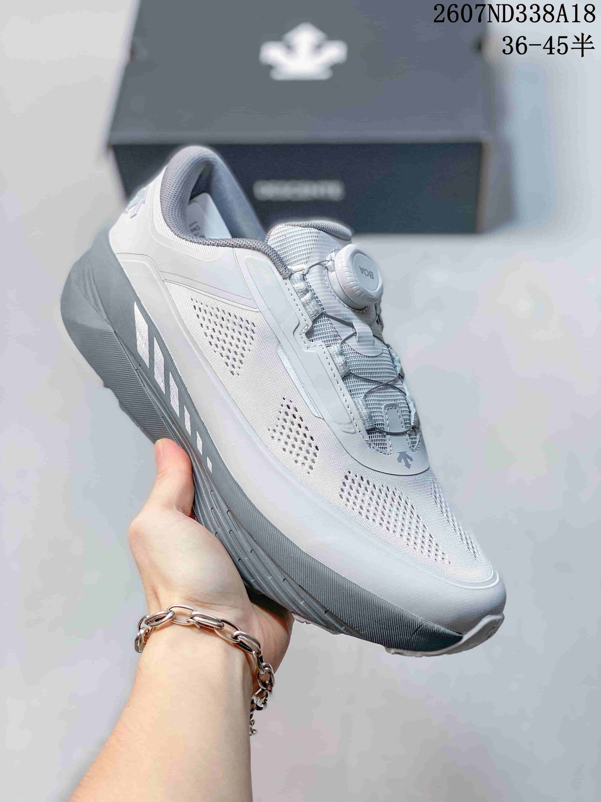 White and Black Descente D.F. Wire 3.0 Sneakers - product image from the listing.