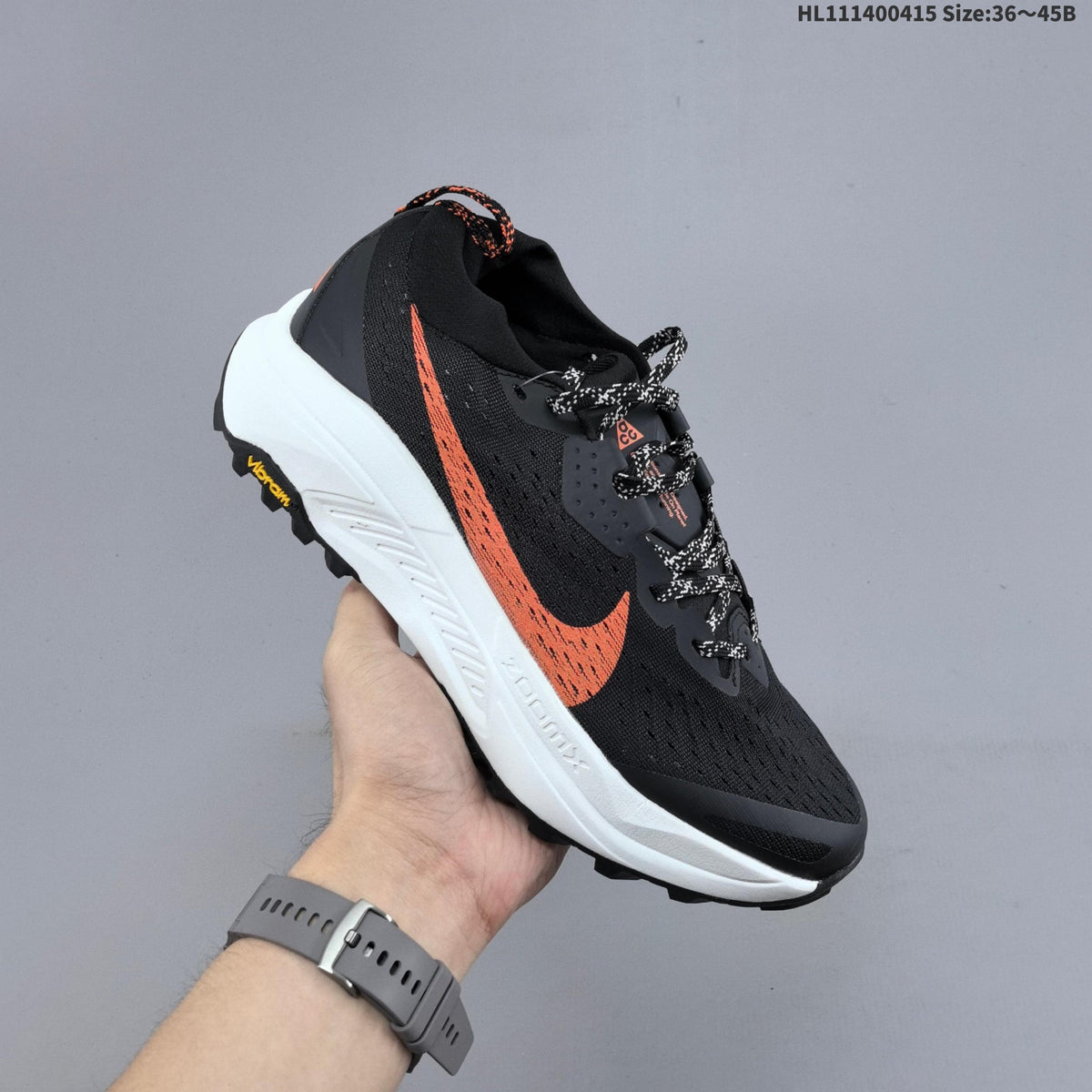 Nike ACG Zegama Trail Running Shoes, in Black and Orange - product image from the listing.