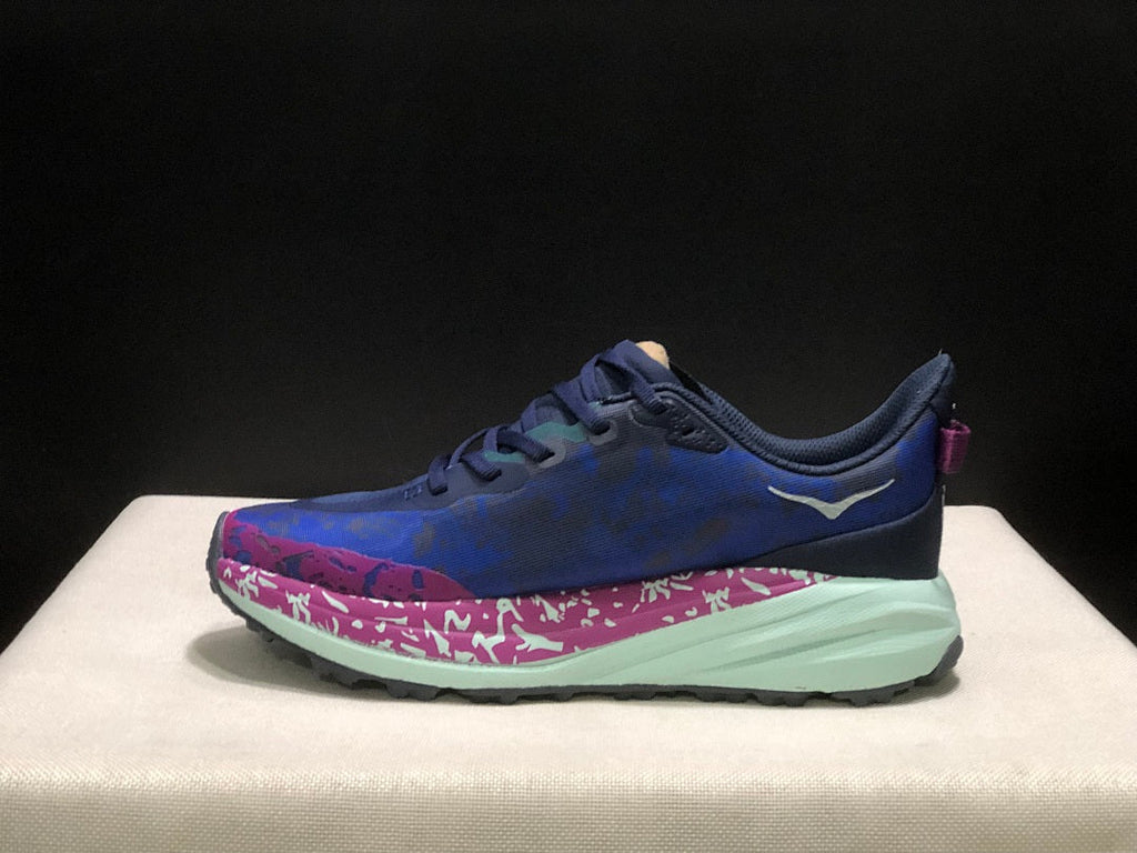 HOKA Speedgoat 6 Trail Running Shoes, in Blue and Pink - product image from the listing.