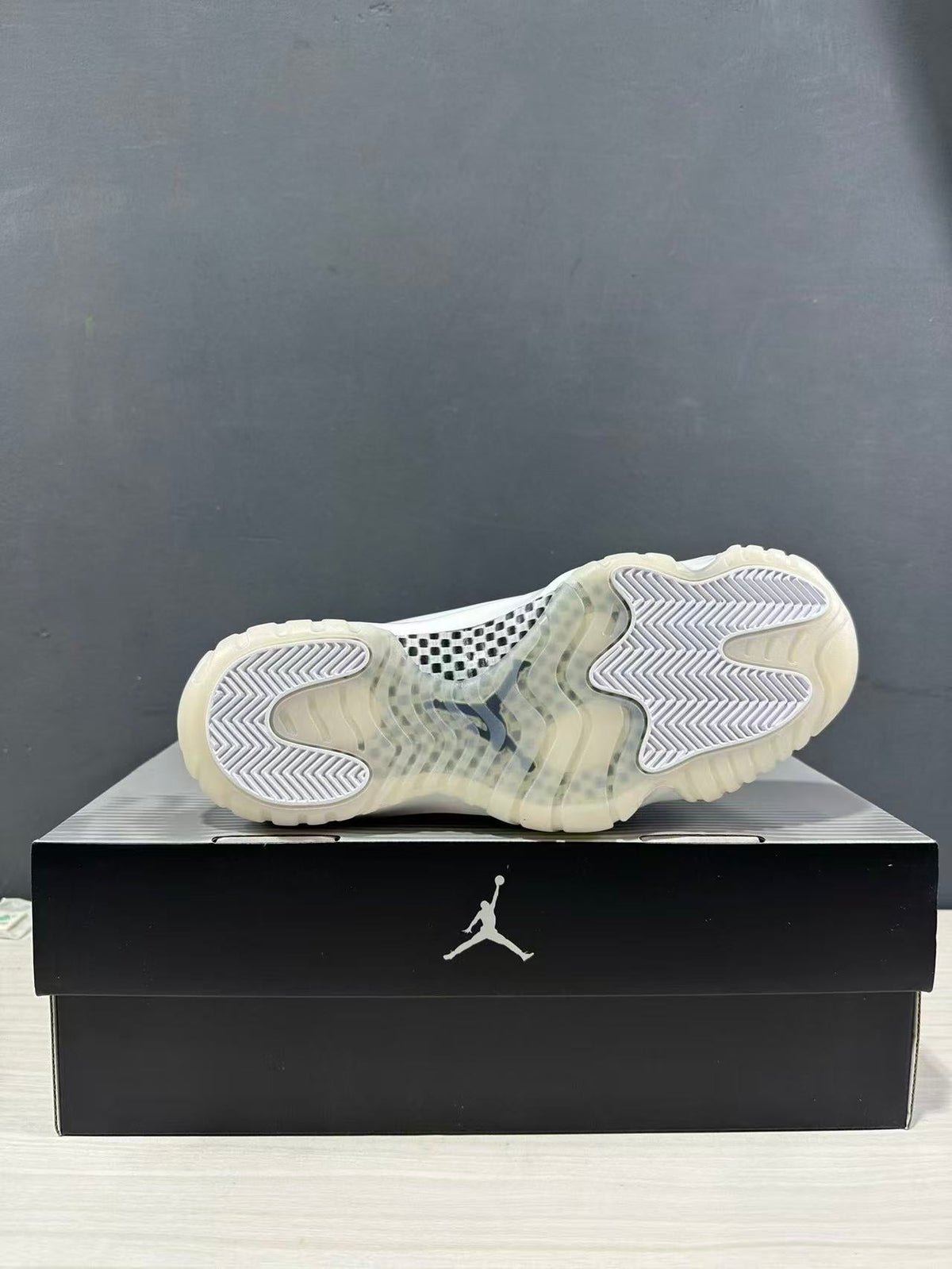 Air Jordan 11 Comme des Garçons White Sneakers IV7639-100 - product image from the listing.