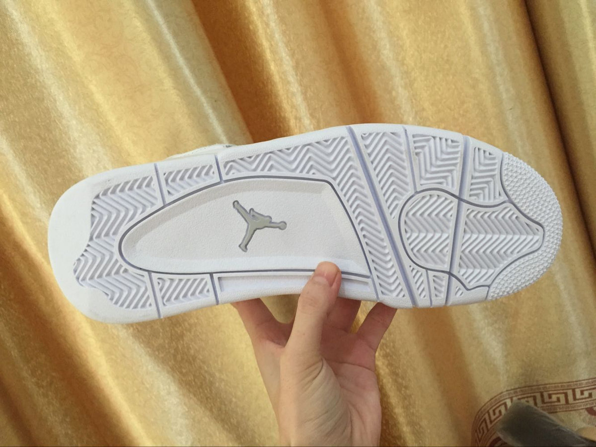 Air Jordan 4 Retro White High-Top Sneakers - product image from the listing.