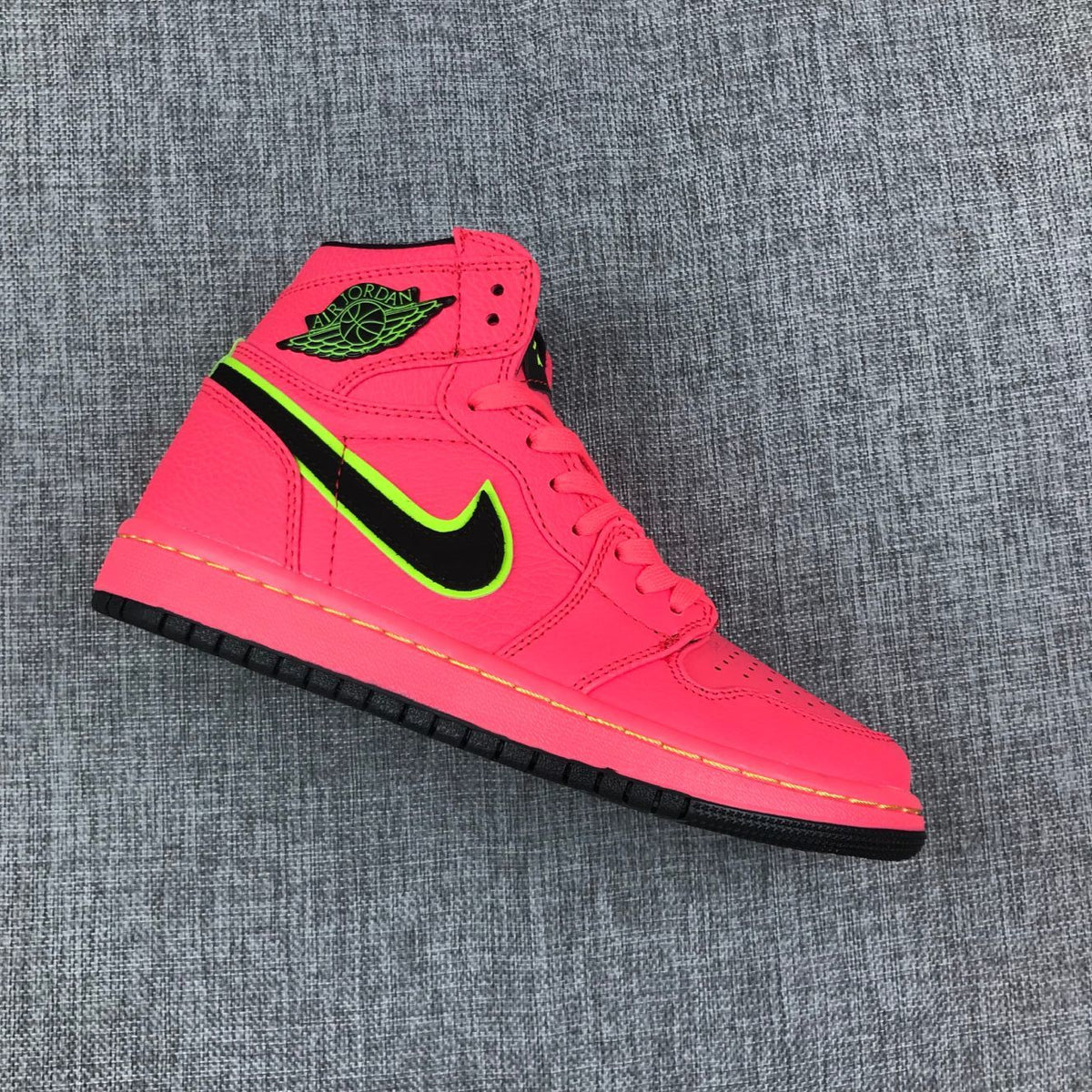 Pink and Black Air Jordan 1 Mid Sneakers AQ9131-600 - product image from the listing.