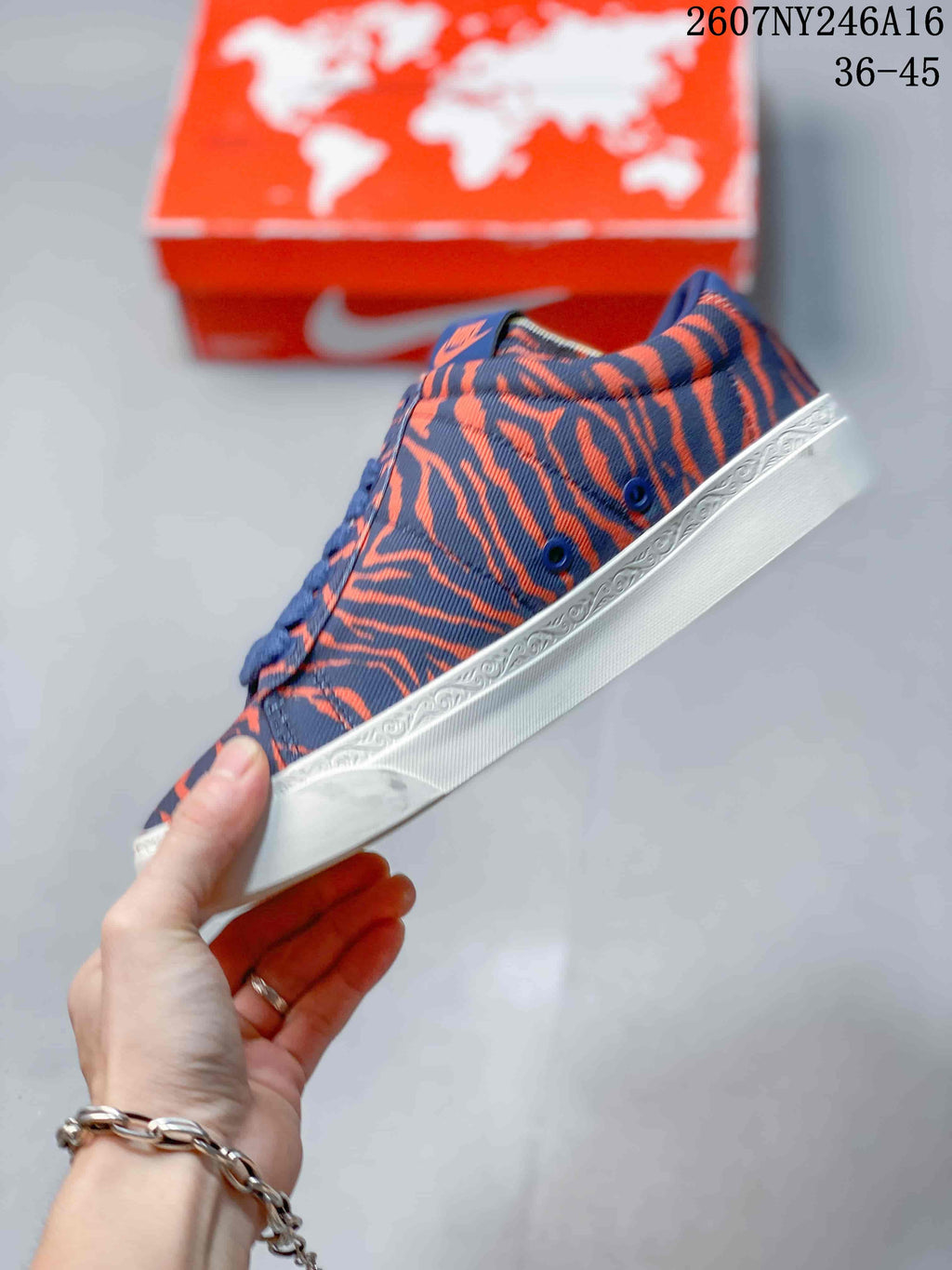 Nike Devin Booker x Blazer Low Trainers Blue/Orange 2607NY246A16 - product image from the listing.