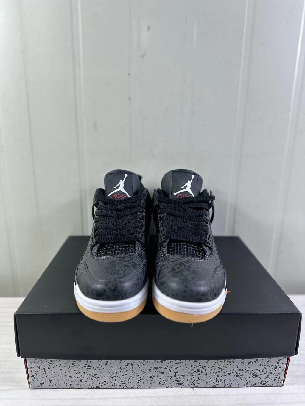 Air Jordan 4 Black Laser Sneakers CI2970-001 - product image from the listing.