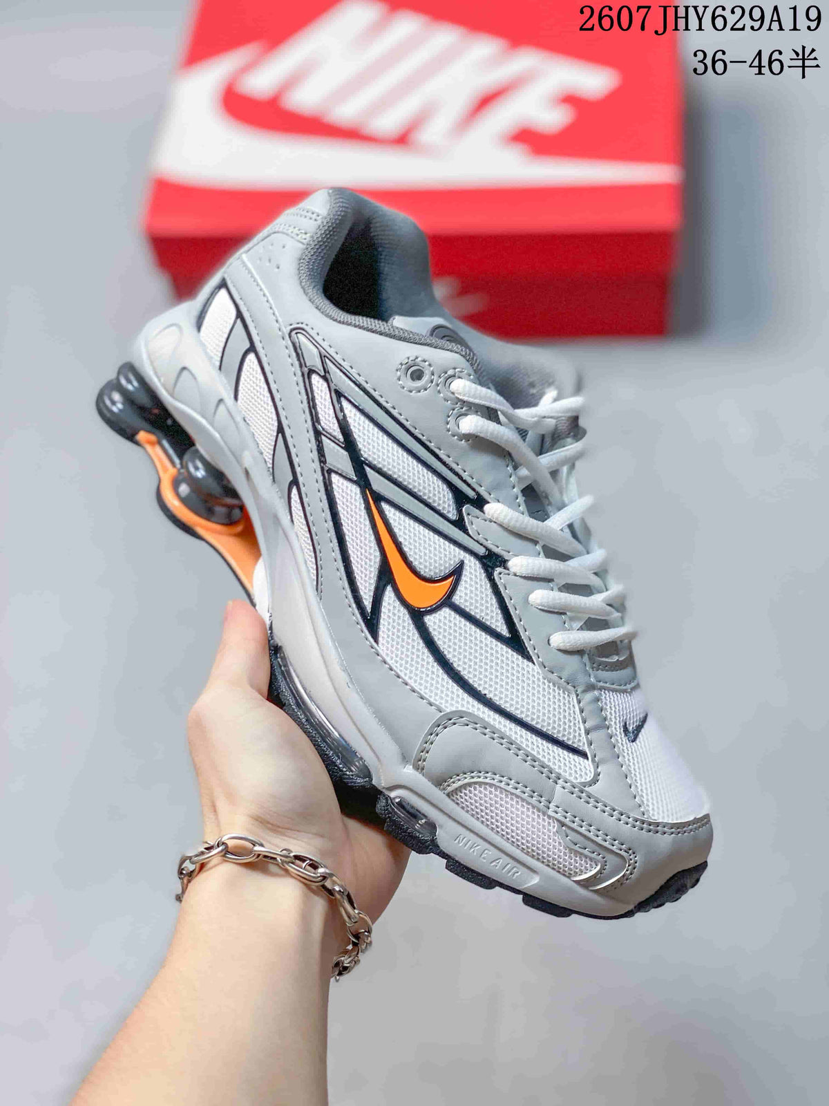 Nike Shox Ride 2 Sneakers in Black or in White - product image from the listing.