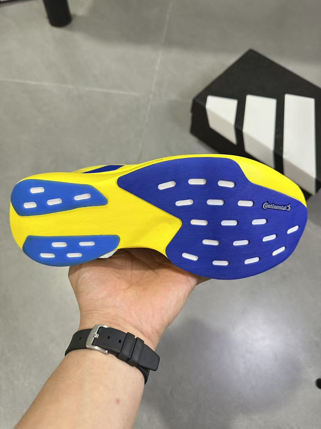 Adidas Lightstrike Pro Running Shoes, in Yellow and Blue - product image from the listing.