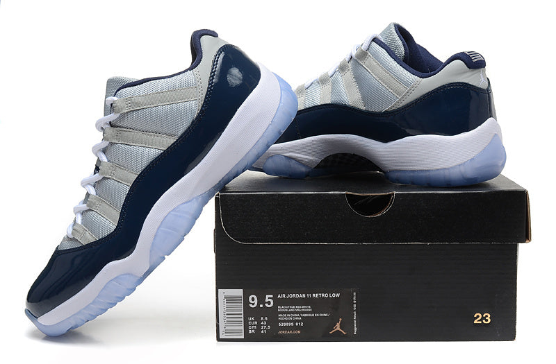 Air Jordan 11 Retro Low Sneakers, White and Navy - product image from the listing.