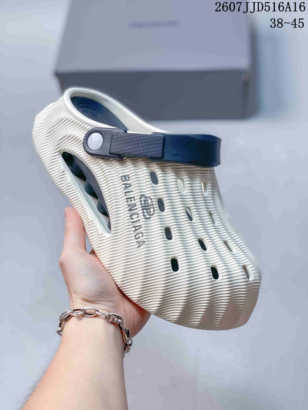 Balenciaga 2607JJD516A16 Clog Sandals Off-White in Navy - product image from the listing.