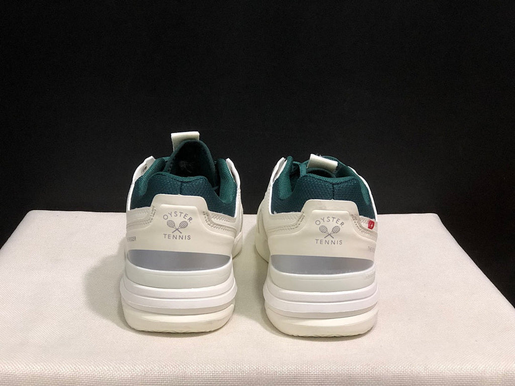 On The Roger Clubhouse Pro Sneakers in White Dark Green - product image from the listing.