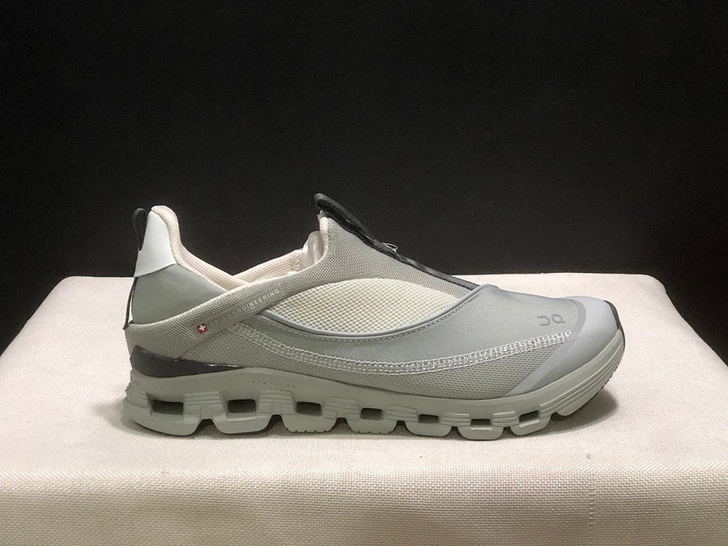 On Cloud 4 Coast Slip-On Sneakers, in Dark Grey - product image from the listing.