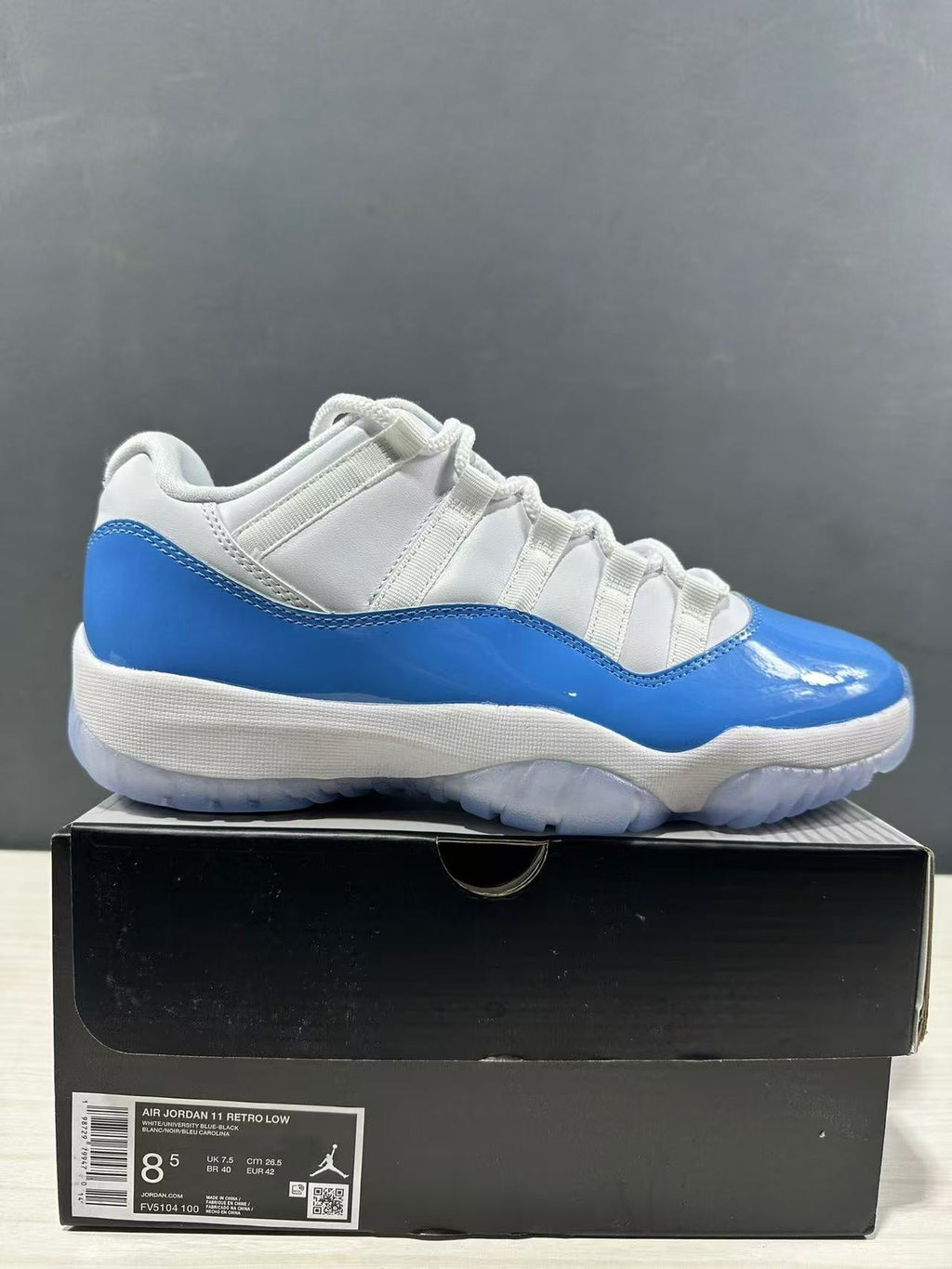 Air Jordan 11 Retro Low UNC Blue Sneakers FV5104-100 - product image from the listing.