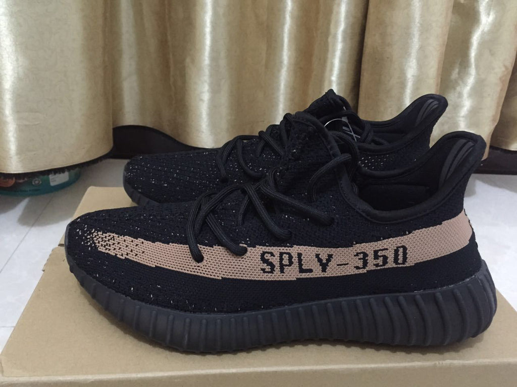 Black and Beige Yeezy 350 V2 Knit Sneakers - product image from the listing.