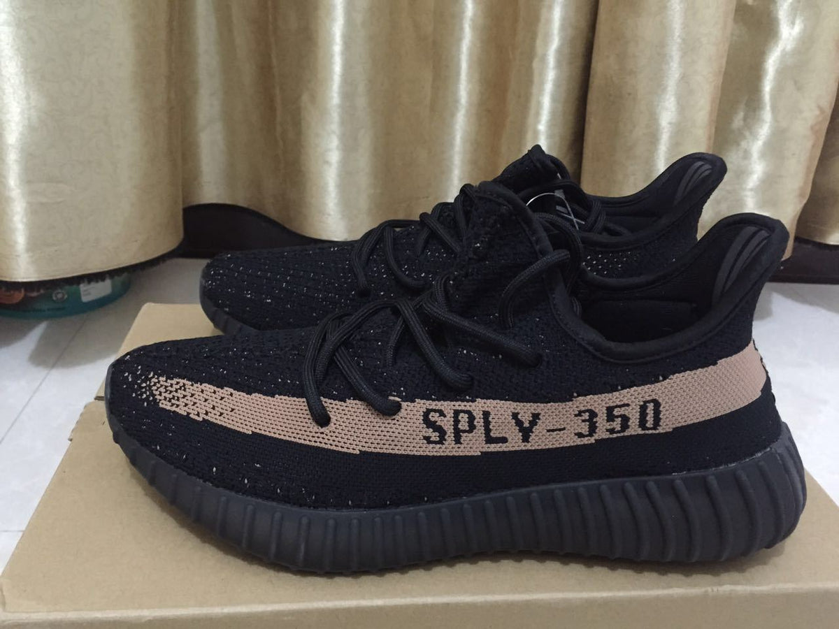 Black and Beige Yeezy 350 V2 Knit Sneakers - product image from the listing.