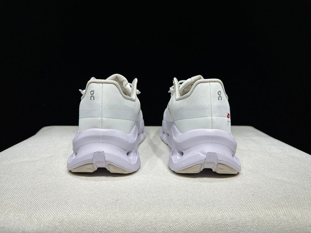 On Cloudtilt Trainers in White and Lavender - product image from the listing.