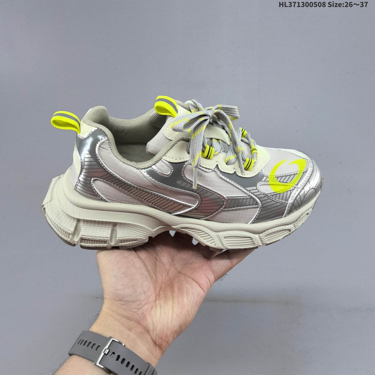Balenciaga Kids Chunky Lace-Up Sneakers, in Silver and Charcoal - product image from the listing.
