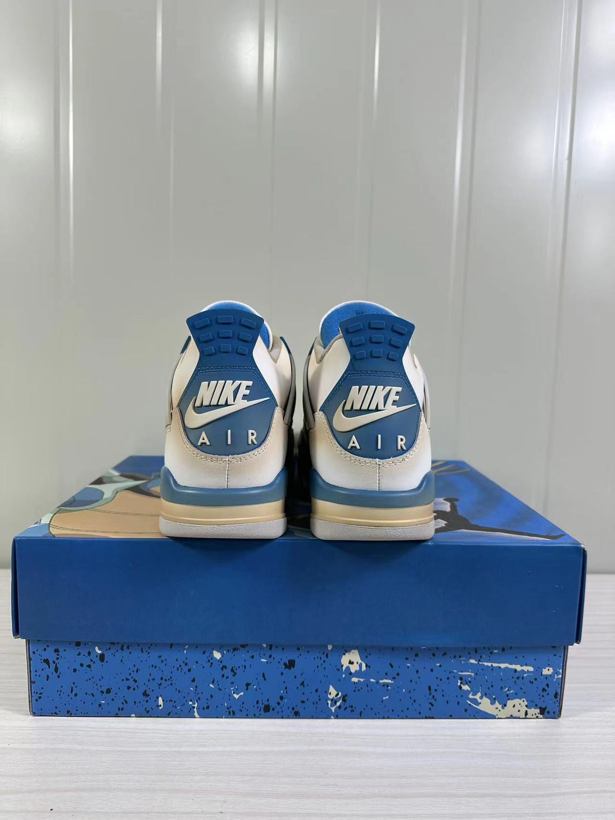 Air Jordan 4 Retro White Blue 308497-105 - product image from the listing.