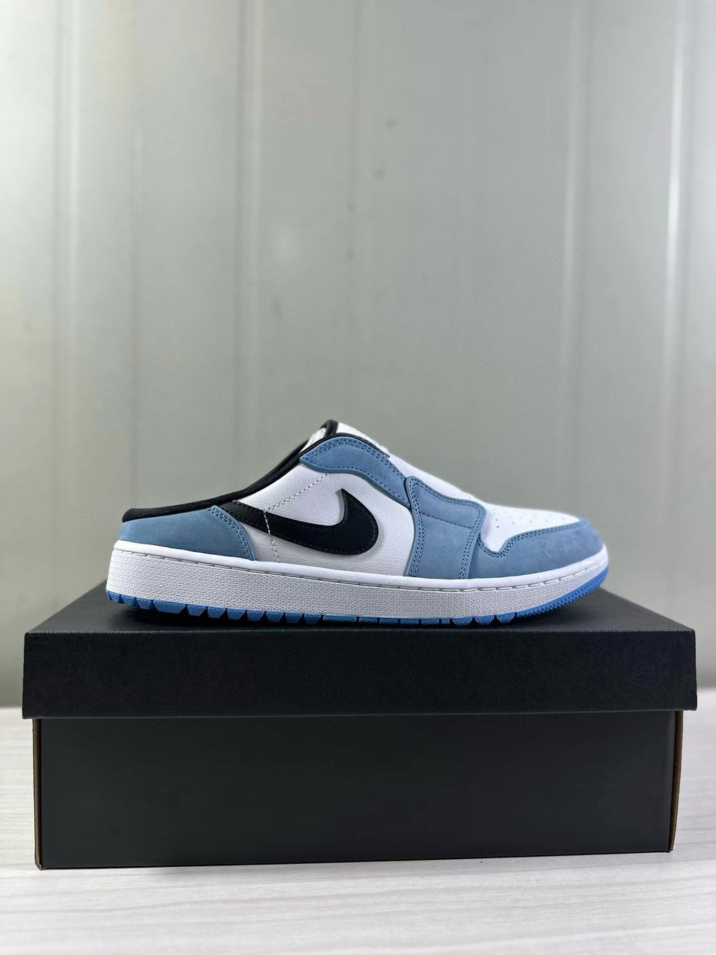 Air Jordan 1 Mule Low Blue White Black FJ1214-400 - product image from the listing.