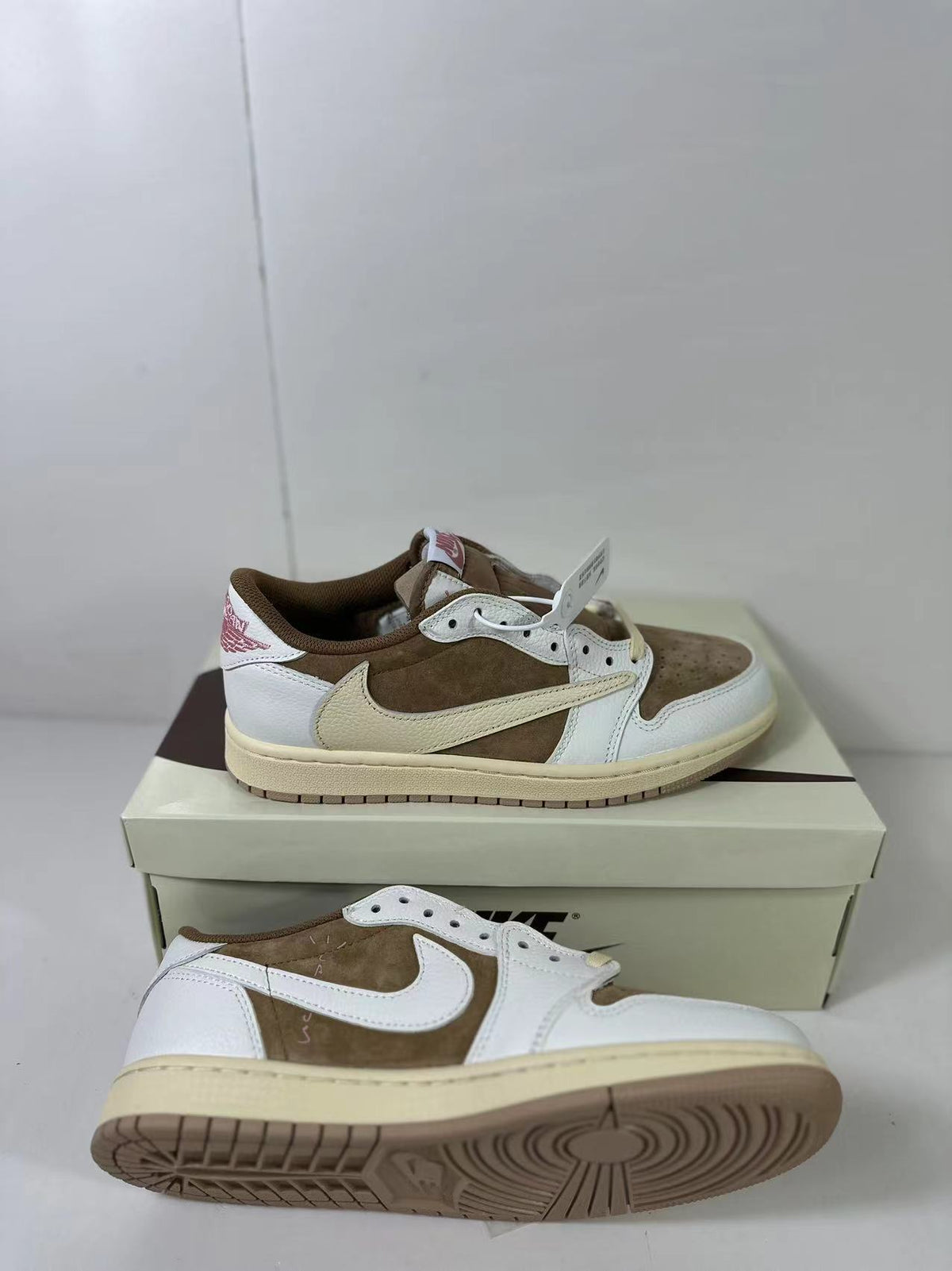 Travis Scott x Air Jordan 1 Low Reverse in Mocha Pink DM7866-106 - product image from the listing.