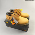 CAT Low-Top Lace-Up Work Boots in Honey in Yellow - product image from the listing.