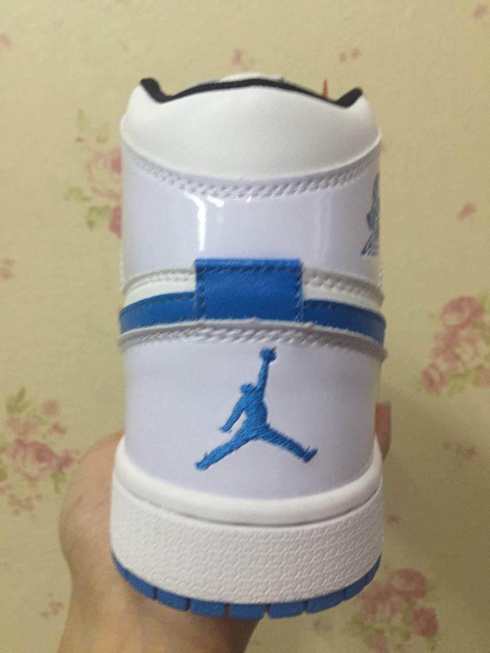 Air Jordan 1 High White and Royal Blue Sneakers - product image from the listing.