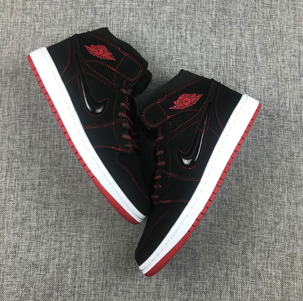 Air Jordan 1 Mid Sneakers Black Red CK5665-062 - product image from the listing.