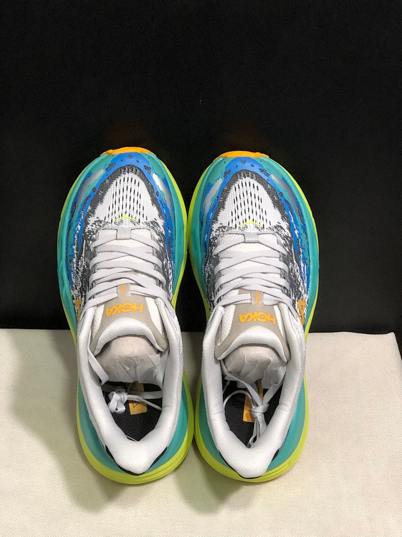 Blue and Lime HOKA Stinson 7 Trail Sneakers - product image from the listing.