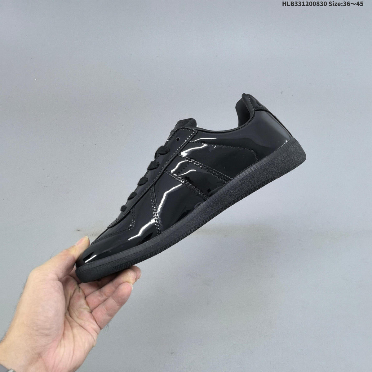 Maison Margiela Replica Low-Cut Sneakers - product image from the listing.