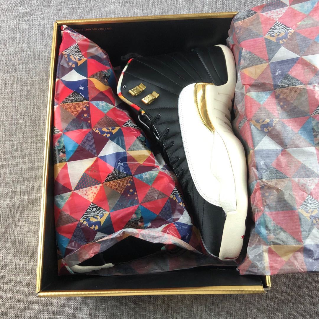 Air Jordan 12 CNY Patchwork High-Top Sneakers Black - product image from the listing.