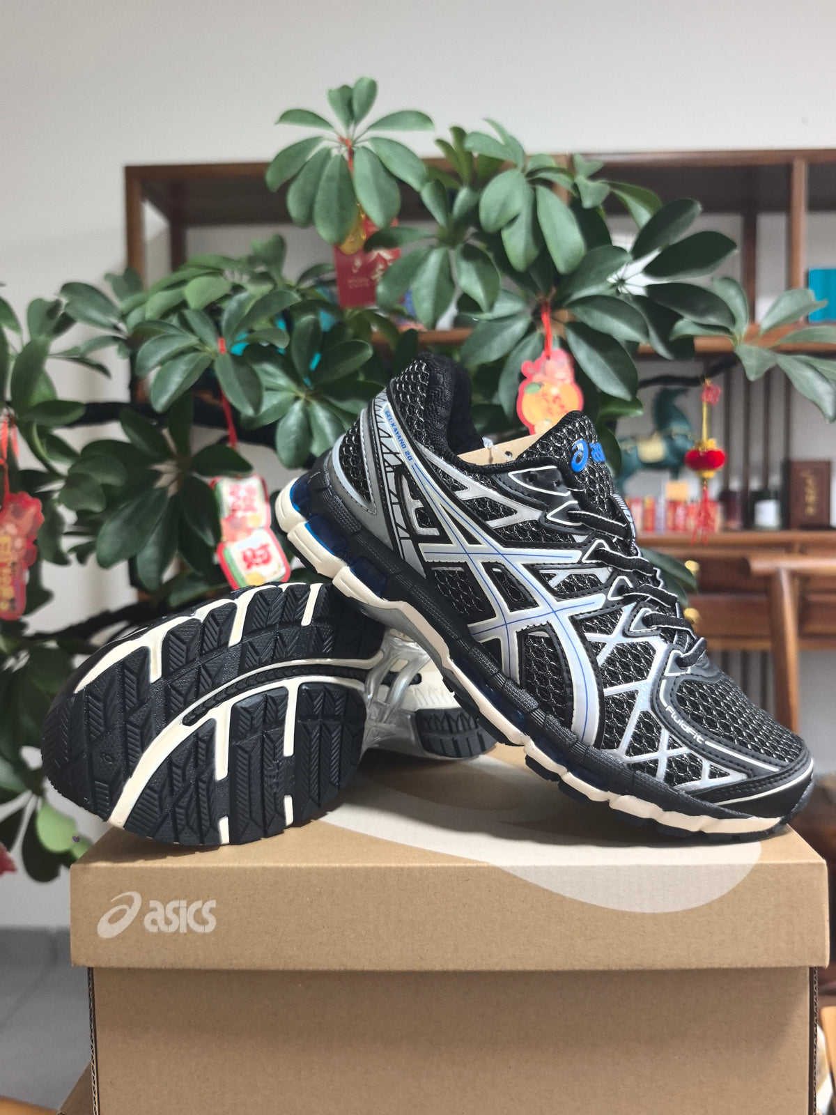 ASICS GEL-KAYANO 20 Sneakers in Black Silver Blue - product image from the listing.