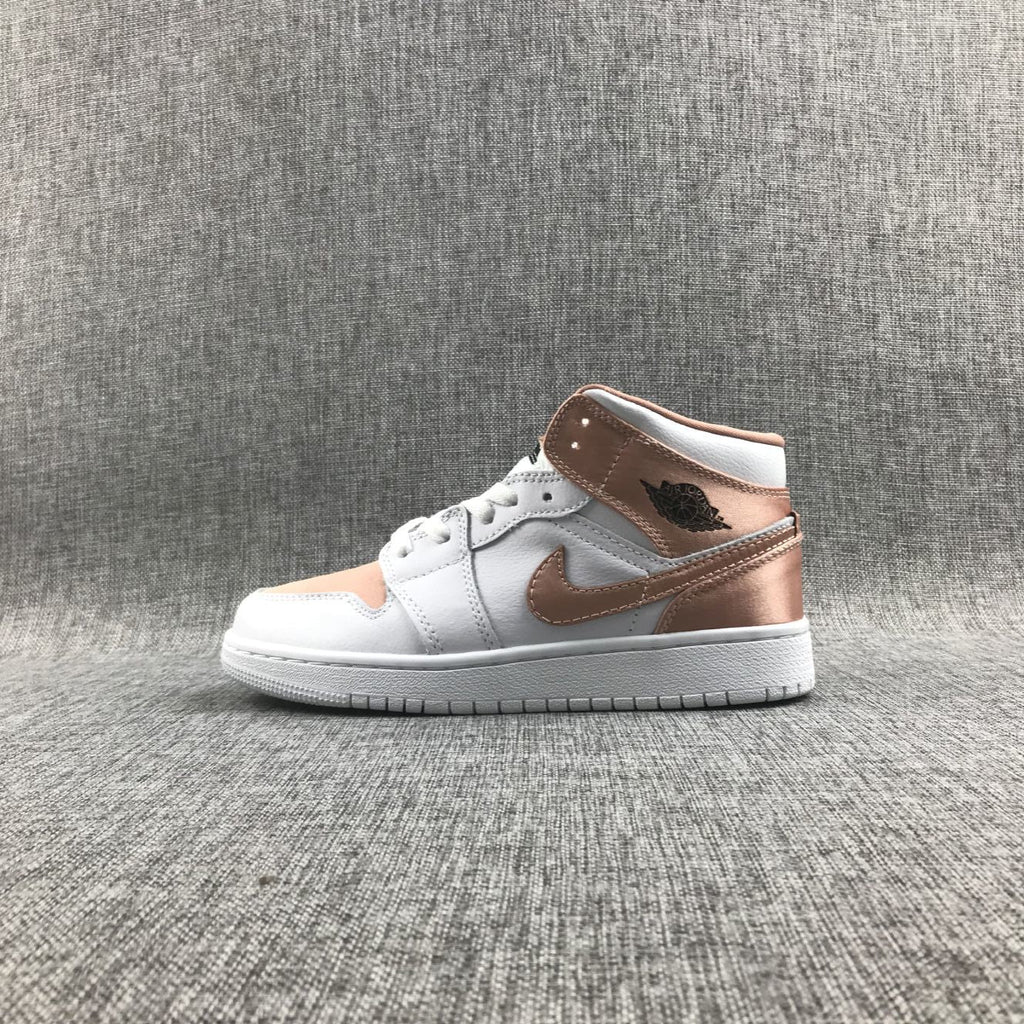 Women's Jordan 1 Mid Rose Gold Silk Sneakers 555112-190 - product image from the listing.
