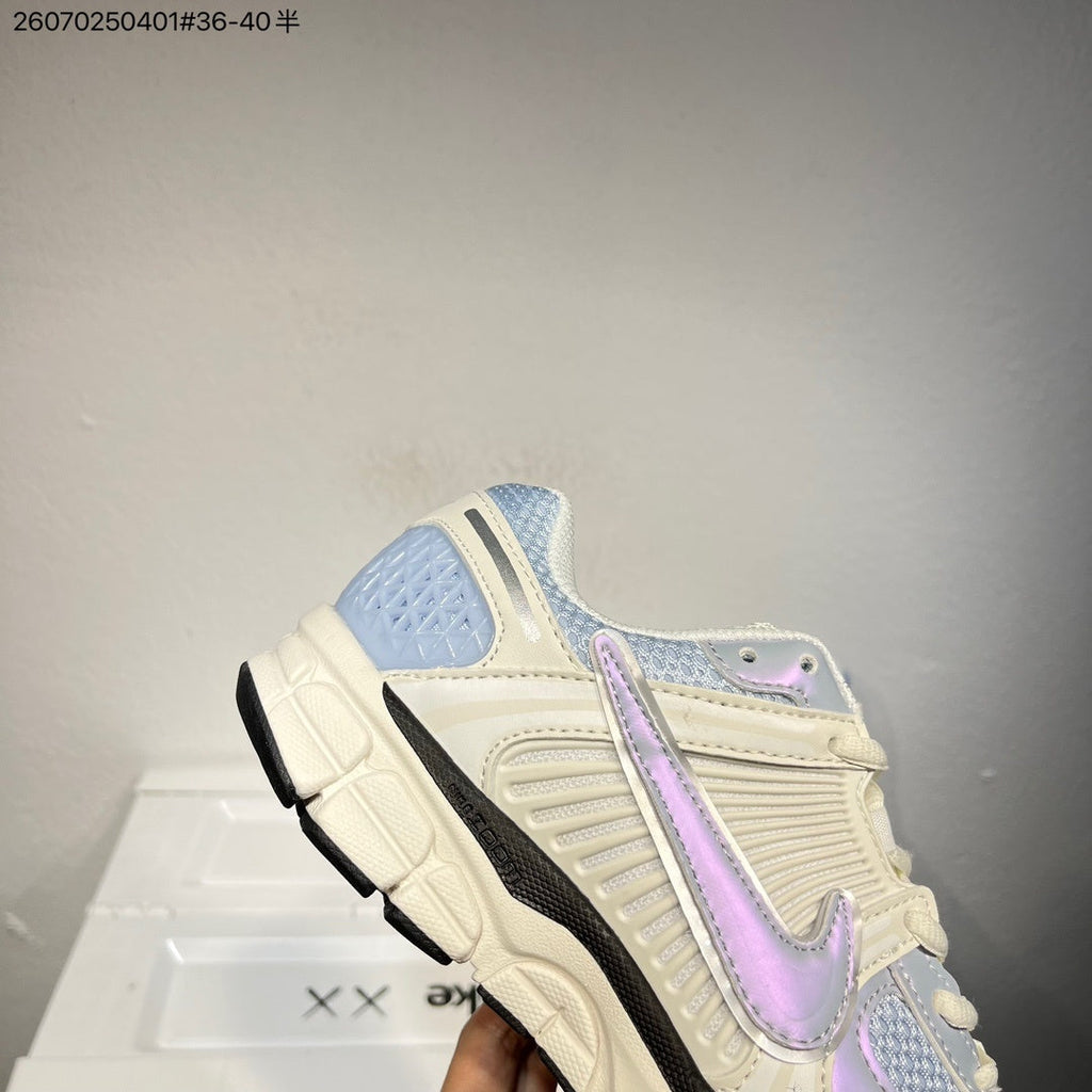 Nike Air Zoom Vomero 5 Trainers in Cream, Blue and Lavender - product image from the listing.